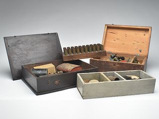Wooden shoting boxes with brass shells and loading tools, early 20th century.