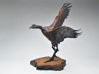 Large bronze of Canada goose in flight, Johnathan Bronson.