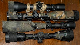 four Simmons rifle Scopes Aetec etc with camo tape some with mounts