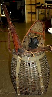pack basket, snowshoes, leather rifle case, single wooden snow shoe