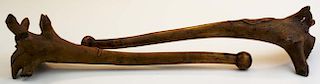 Pair of carved circa 1900 Northeast woodlands Native American spruce root war clubs with leaf carvin