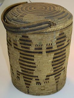 Pima coil Native American covered basket with handle having 6 figural lizard decorations. 11"h and 9
