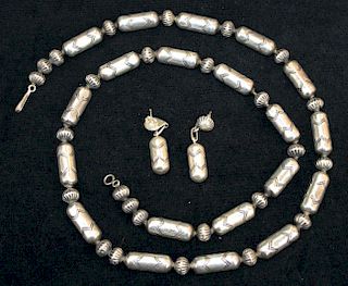 Signed EY sterling Navajo sterling necklace and matching earrings.