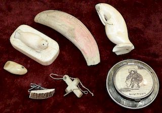Lot of scrimshaw Eskimo/Inuit whale carvings including seal 2¾", walrus 3", sperm whale tooth 4½". 4