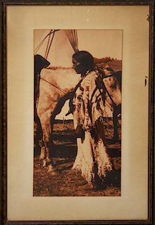 Edward S Curtis (1868-1952) sepia toned photogravure print of Plains Indian, 20” x 9”