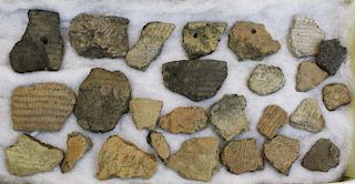Vermont prehistoric pottery pieces including rimsherds, drag stamped, rocker stamped, & punctate dec