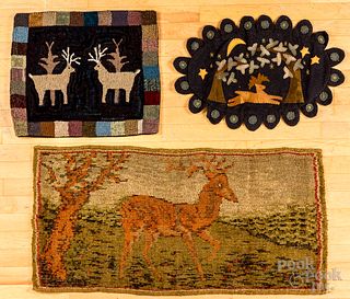 Three stag rugs, mid 20th and later
