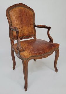Antique French Exotic Anaconda Snakeskin Upholstered Louis XV Style Carved Walnut Armchair, circa 1900