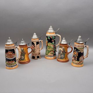 LOTE DE TARROS ALEMANIA, SIGLO XX Elaborados en cerámica policromada  de 26 a 36 cm  detalles de conservación  piezas: 6