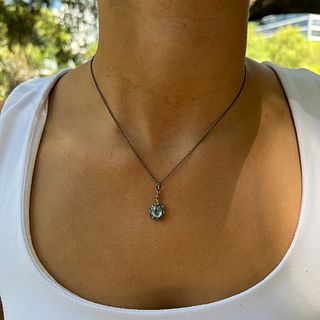 Silver and Gold Blue Zircon Pendant