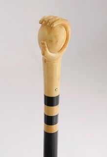 Whaleman Carved Antique Whale Ivory Hand Grasping a Ball Walking Stick, 19th Century