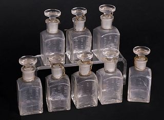 Eight American Clear Glass Ship's Apothecary Bottles, 19th Century