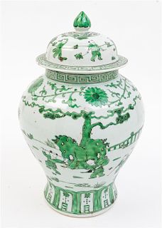 * A Famille Verte Porcelain Jar and Cover Height 13 1/4 inches.