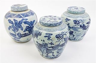 * Three Blue and White Porcelain Jars and Covers Height of tallest 10 inches.