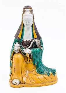 * A Sancai Glazed Pottery Figure of Guanyin Height 12 1/2 inches.