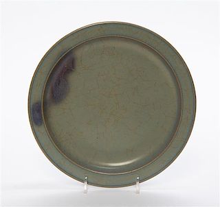 A Chinese Junyao Glazed Stoneware Plate Diameter 8 3/4 inches.