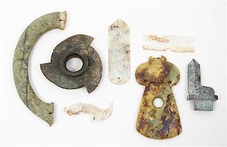 * A Group of Eleven Archaic Jade Items Length of largest 14 inches.