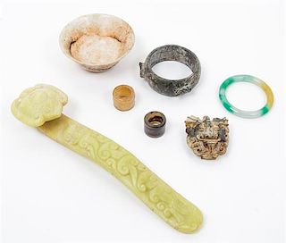 * A Group of Seven Archaic Jade Items Length of largest 12 inches.