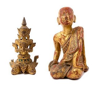 Two Carved Wood Seated Figures Height of first 10 1/2 inches.