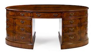 A Georgian Style Burlwood Double Pedestal Desk Height 30 3/4 x width 72 1/2 inches x depth 39 1/2 inches.