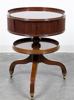 * A Georgian Style Mahogany Drum Table Height 29 x diameter 21 3/4 inches.