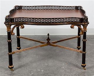 A Chippendale Style Parcel Gilt and Ebonized Low Table Height 21 5/8 x width 32 1/4 x depth 22 1/4 inches.