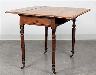 An American Mahogany Drop Leaf Table Height 28 1/2 x width 21 x depth 34 inches (closed).