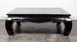 A Chinese Style Parcel Gilt Ebonized Low Table Height 18 x width 50 x depth 50 inches.