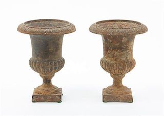 A Pair of Victorian Cast Iron Urns Height 6 1/4 inches.