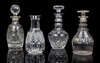 Four Cut Glass Decanters Height of tallest 10 1/2 inches.