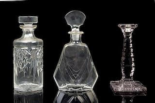 Five Molded or Cut Glass Decanters Height of tallest 13 inches.