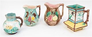 Four Majolica Pitchers Height of tallest 7 1/2 inches.