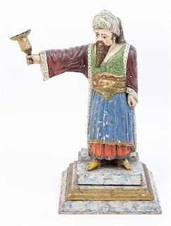 A Carved and Polychrome Wood Figure Height 16 3/4 inches.