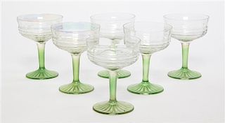 A Group of Six Iridescent Glass Champagne Coupes Height 4 3/4 inches.