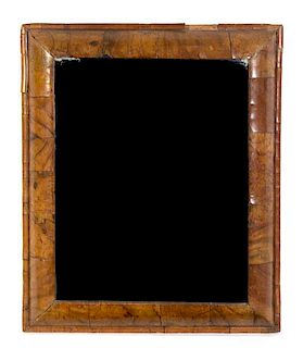 A Continental Burlwood Mirror Height 24 3/4 x width 21 inches.