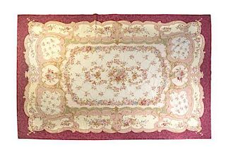 An Aubusson Style Wool Tapestry 20TH CENTURY 9 feet 7 inches x 13 feet 10 inches.