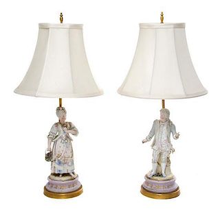 A Pair of Continental Bisque Porcelain Figures Height 11 inches.