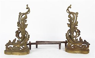 * A Pair of Louis XV Style Brass Chenets Height 17 3/4 inches.