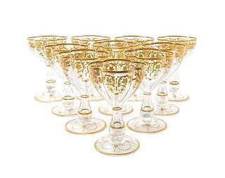 * A Set of Ten Continental Gilt Decorated Blown Glass Wines Height 5 inches.