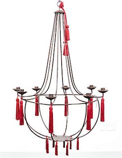 An Empire Style Iron Eight-Light Chandelier Height 32 1/2 x diameter 22 1/2 inches.