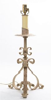 * A Painted Wrought Iron Pricket Stick Height 21 1/2 inches.