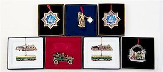 A Group of Seven Commemorative Christmas Ornaments Width of first 3 3/8 inches.