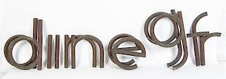A Set of Art Deco Bronze Storefront Letters Height of first 14 1/2 inches.