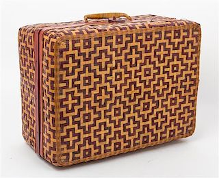 A Woven Reed Suitcase Height 8 x width 16 1/2 inches.