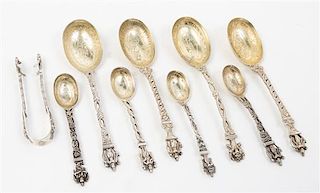 * A Group of Southeast Asian Silver Articles, , comprising four spoons, four serving spoons, one pair of tongs, and two bowls.