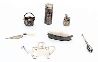 Three English Silver Articles, 20TH CENTURY, comprising a shotgun shell coin holder, James Purdey & Sons, a small jar with mouse