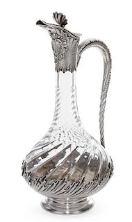 A French Silver Mounted Glass Claret Jug, 19th/20th Century, of baluster form, the glass with twist decoration, the silver with