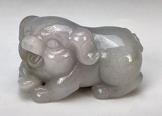 Carved White Jade Figure of an Eating Pig