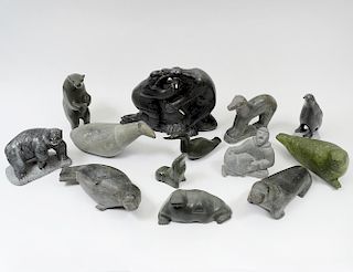 GROUP OF THIRTEEN NATIVE INUIT STONE CARVINGS