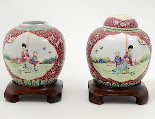 PAIR OF ENAMEL DECORATED PORCELAIN JARS AND COVERS
